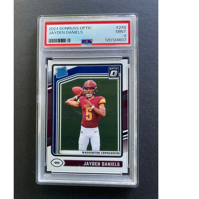 Jayden Daniels 2024 Optic 248 Commanders Rated Rookie PSA
 9