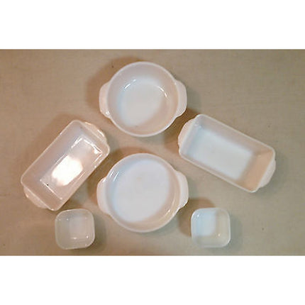 Vintage Fire King 9-Piece Light Orange / White Interior Baking Set