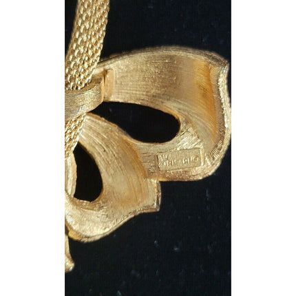 Vintage Crown Trifari Gold Tone Slide Bow Lariat Necklace